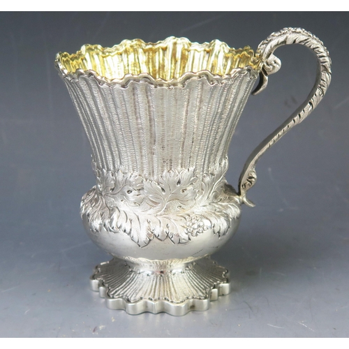 541 - A George IV  silver mug, maker H.L possibly Henry Ledger, London, 1827, of campagna form with banded... 