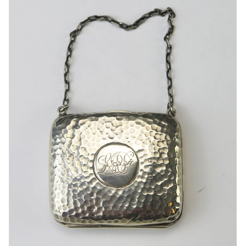 565 - An Edward VII beaten silver purse, maker S & Co Birmingham, 1906, monogrammed, of rectangular form w... 