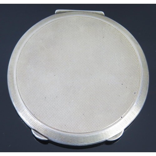 567 - A George Vi silver and enamel powder compact, maker Henry Clifford Davis, Birmingham, 1951, of circu... 