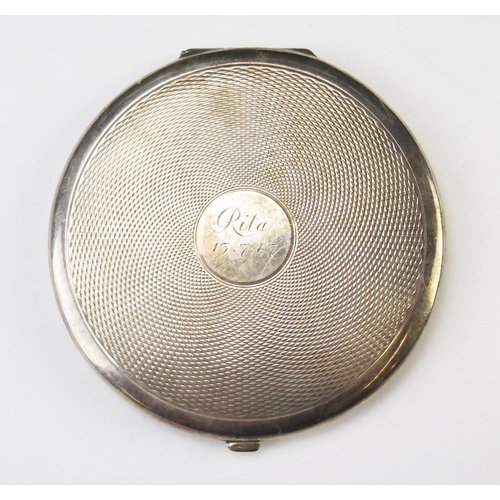 568 - A George Vi silver compact, maker Padgett & Barham Ltd, London, 1945, inscribed and dated, of circul... 