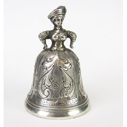 574 - A continental silver call bell, in the form of a woman in a hooped dress, bears import marks for She... 