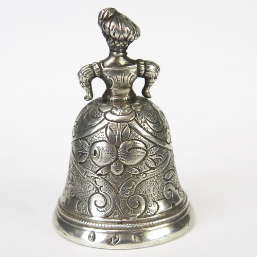 574 - A continental silver call bell, in the form of a woman in a hooped dress, bears import marks for She... 