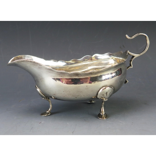 576 - A George III silver sauceboat, maker James Crawford, Newcastle. 1784/5, incused monarch's head, of t... 