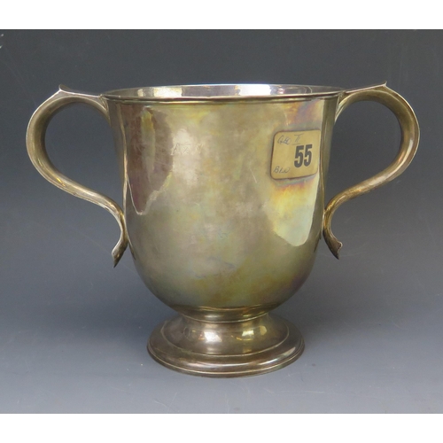 586 - A George II silver twin handled loving cup, makers mark worn, London, 1729, initialled, with scrolli... 