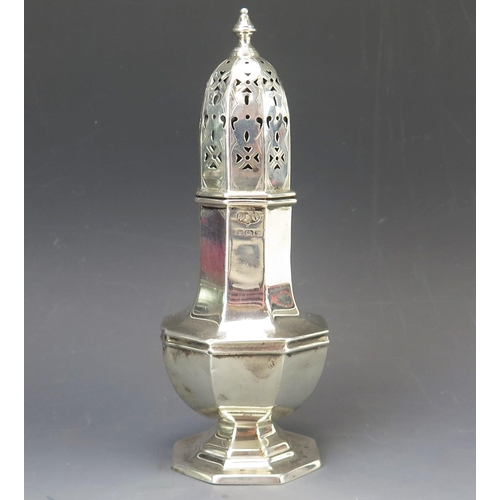 591 - A George V silver sugar caster, maker Wilson & Gill, Birmingham, 1924, of octagonal baluster form, o... 