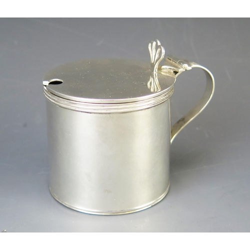 601 - An Edward VII silver mustard pot and cover, maker Mappin & Webb, Birmingham, 1908, of plain cylindri... 