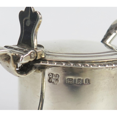 620 - A George V silver mustard pot and cover, maker D & J Wellby  Ltd, London, 1926, of cylindrical outli... 