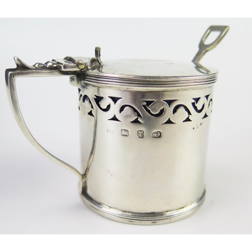 623 - A Victorian silver mustard pot and cover, makers mark worn and rubbed, Birmingham, 1890, monogrammed... 