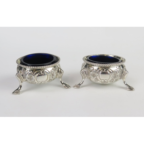 624 - A pair of Victorian silver cauldron salts, maker Henry Wilkinson & Co, London, 1873, with repousse f... 