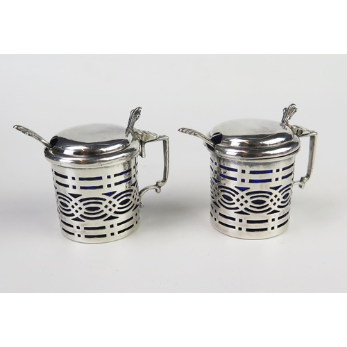 625 - A pair of Edward VII silver mustard pots, maker George Nathan & Ridley Hayes, Chester, 1906, of cyli... 