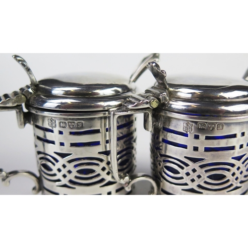 625 - A pair of Edward VII silver mustard pots, maker George Nathan & Ridley Hayes, Chester, 1906, of cyli... 