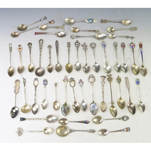 633 - A collection of continental silver and enamel souvenir spoons, Chinese silver teaspoons, gross weigh... 