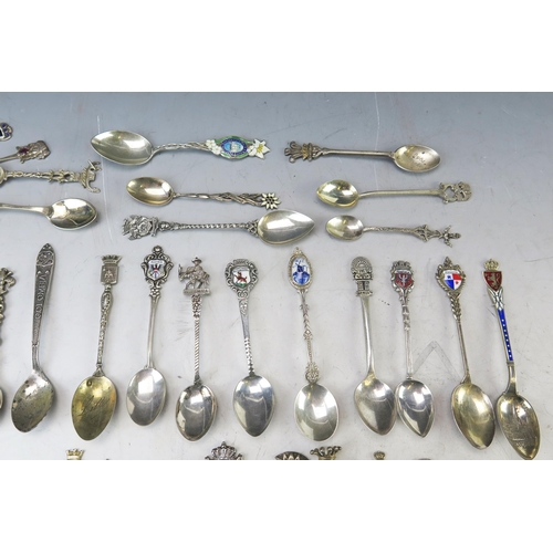 633 - A collection of continental silver and enamel souvenir spoons, Chinese silver teaspoons, gross weigh... 