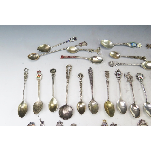 633 - A collection of continental silver and enamel souvenir spoons, Chinese silver teaspoons, gross weigh... 