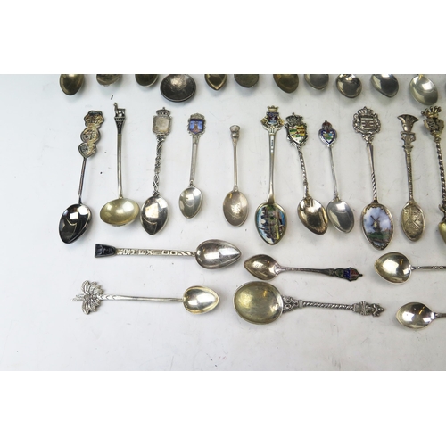 633 - A collection of continental silver and enamel souvenir spoons, Chinese silver teaspoons, gross weigh... 