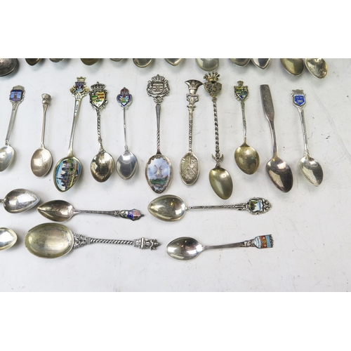 633 - A collection of continental silver and enamel souvenir spoons, Chinese silver teaspoons, gross weigh... 