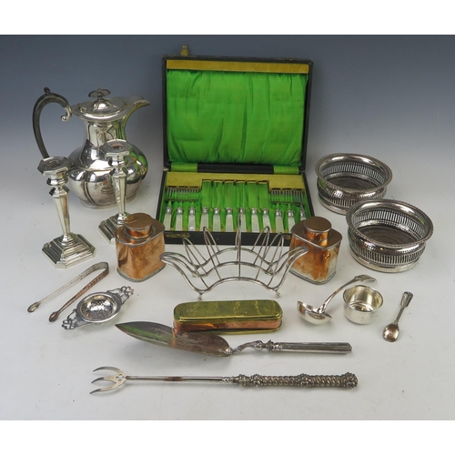 642 - A collection of assorted plated wares, includes a pair of bottle coasters, coffee pot, toast rack et... 