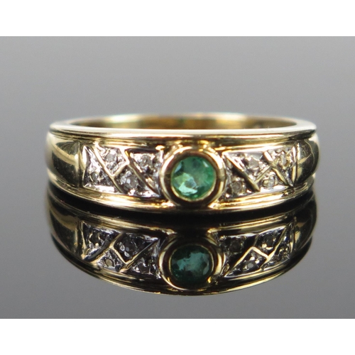 65 - A 9ct Gold, Emerald and Diamond Ring, size P.5, 3.1g