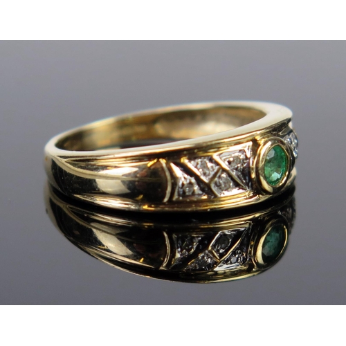 65 - A 9ct Gold, Emerald and Diamond Ring, size P.5, 3.1g