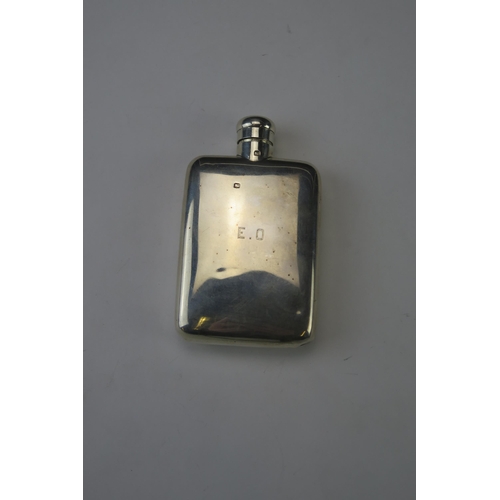 650 - A George V silver hip flask, maker's mark worn, London, 1919, initialled, of plain rectangular form,... 