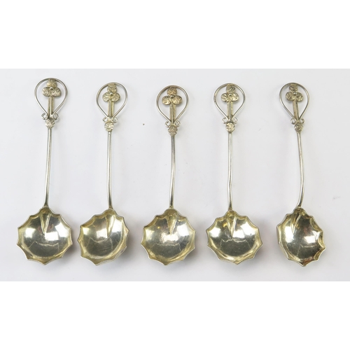 652 - A set of five white metal spoons, with lobed bowls slender stems with foliate terminals, 52gms, 1.70... 