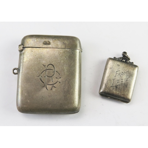 657 - A George V silver vesta case, maker John Milward Banks, Chester 1913, monogrammed, together with a s... 