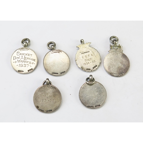 664 - A collection of silver and enamel fob medallions, mostly P&D United Churches League, total weight of... 