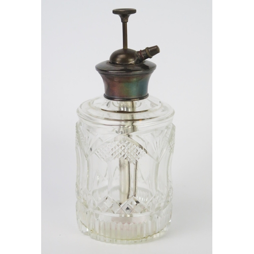 685 - A clear glass and silver plate mounted atomiser, of cylindrical form with hobnail and palmette decor... 