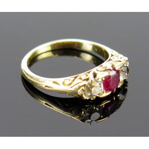 83 - A Ruby and Diamond Three Stone Ring in an unmarked high carat gold setting, 5mm ruby, EDW .42ct, siz... 