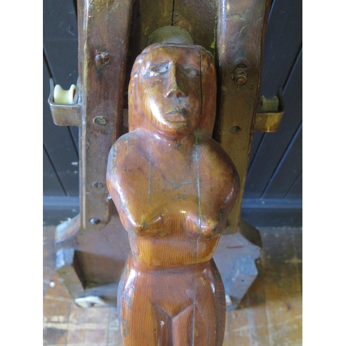 906 - A Ships bowsprit, mounted with a female nude figurehead, overall height 122cm.