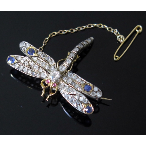 91 - A Dragonfly Brooch, the unmarked gold setting mounted with diamonds, sapphires and cabochon red ston... 