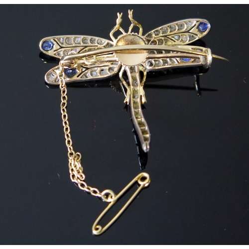 91 - A Dragonfly Brooch, the unmarked gold setting mounted with diamonds, sapphires and cabochon red ston... 