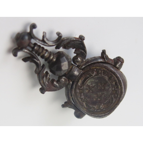 919 - An 18th century steel triple matrix seal on scroll suspension, contained in a shagreen case, togethe... 