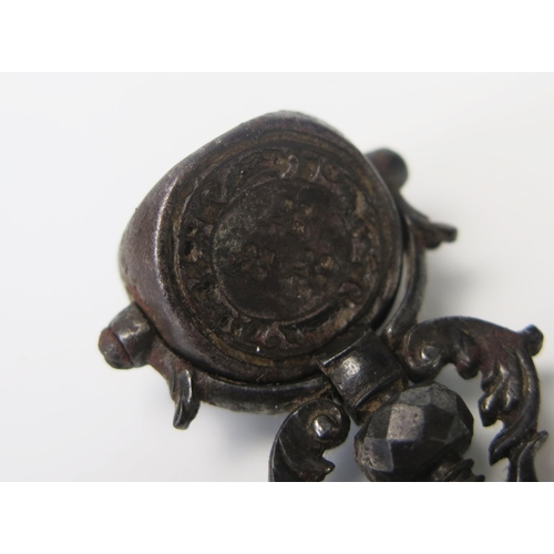 919 - An 18th century steel triple matrix seal on scroll suspension, contained in a shagreen case, togethe... 