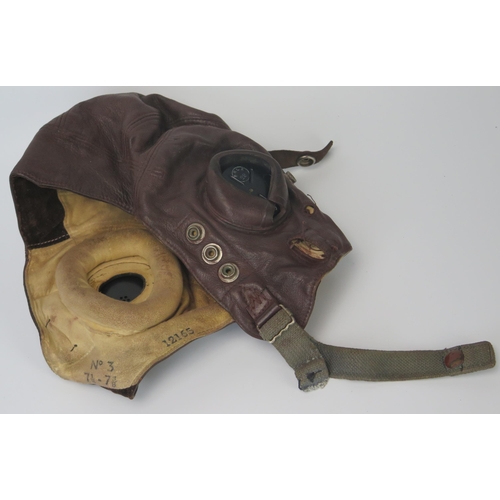 935 - A WWII period RAF C-Type brown leather flying helmet, bears P&SW1 stamp serial No 12165, size No 3 7... 