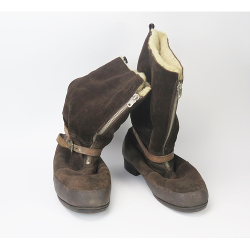 937A - A pair of sheepskin lined flying boots, with zip fronts and tightening strap.