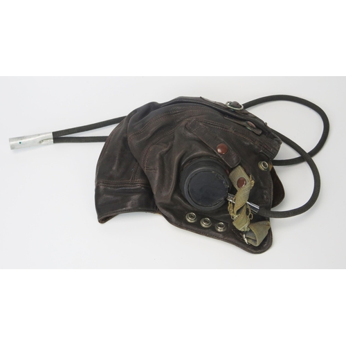 944 - A WWII RAF C Type brown leather flying helmet, with Gosport tubes, worn stamp marks to liner.