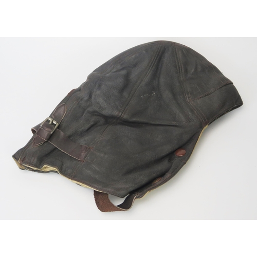 945 - A WWII period RAF Type B brown leather flying helmet, by Waddington & Son Ltd, with Air Ministry sta... 