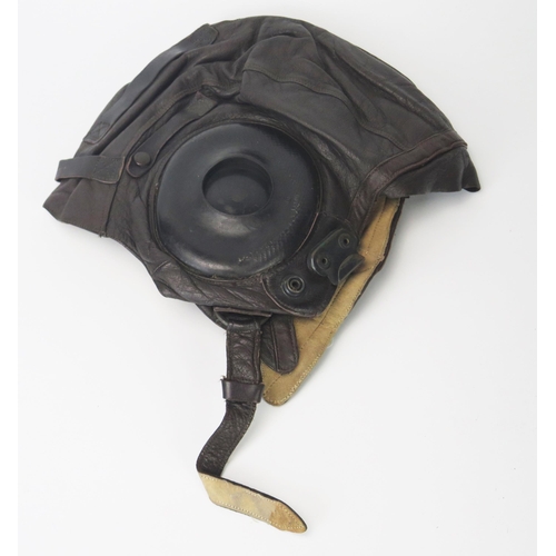 946 - An American Type A-11 brown leather flying helmet, by the Selby Shoe Company, size large.