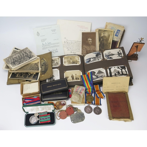 950 - The Woodley Family of Devonport medals and ephemera, includes a WWI pair to 51602 Pte. J. J. Woodley... 