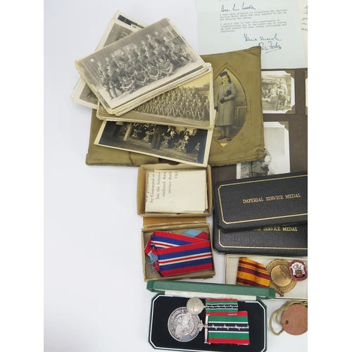 950 - The Woodley Family of Devonport medals and ephemera, includes a WWI pair to 51602 Pte. J. J. Woodley... 