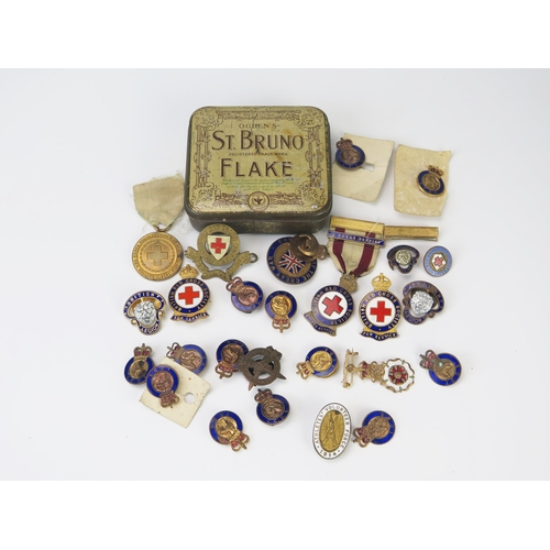 952 - A collection of Industrial Civil Defence Service (ICDS) badges, British red Cross badges, and other ... 