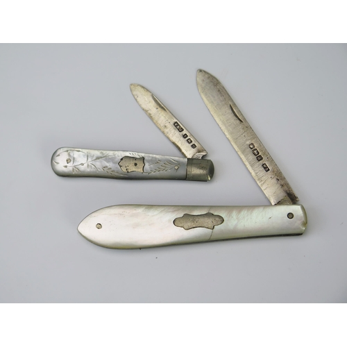 953 - Two silver bladed and mother-of-pearl handled folding fruit knives (2)