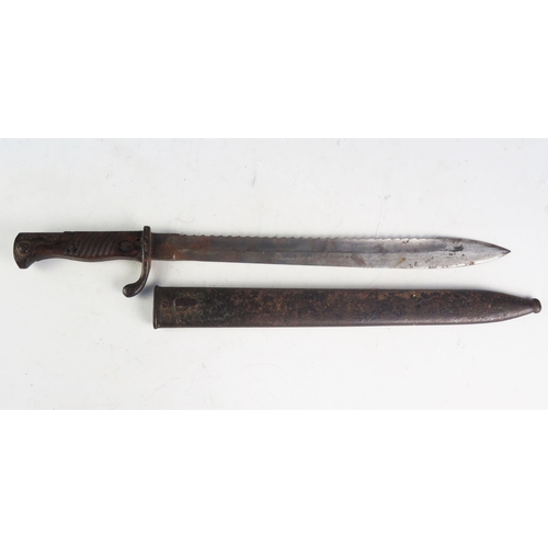 954A - A German Pioneer bayonet, model 98/05 with serrated saw back to the 37cm fullered blade, contained i... 