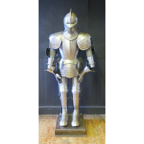 961 - A replica late 15th/early 16th century full size steel suit of English armour, fully articulated and... 