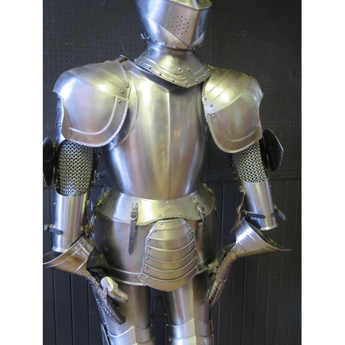 961 - A replica late 15th/early 16th century full size steel suit of English armour, fully articulated and... 