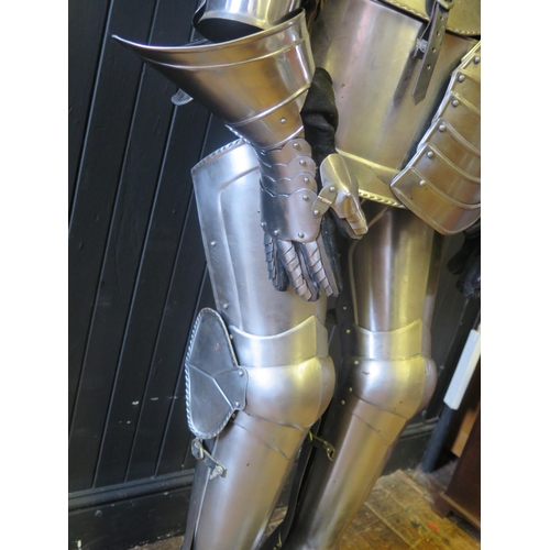 961 - A replica late 15th/early 16th century full size steel suit of English armour, fully articulated and... 