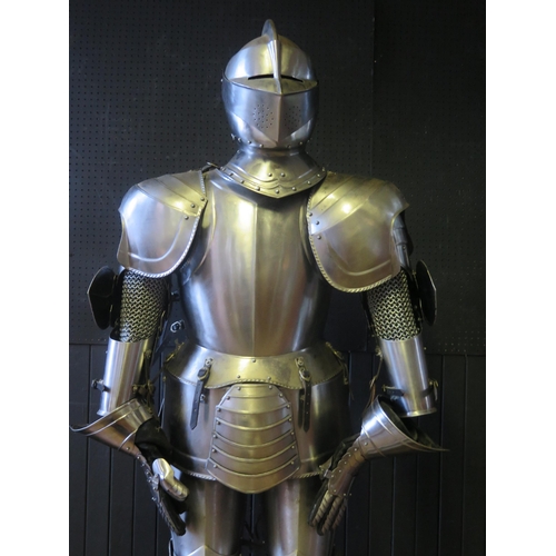 961 - A replica late 15th/early 16th century full size steel suit of English armour, fully articulated and... 