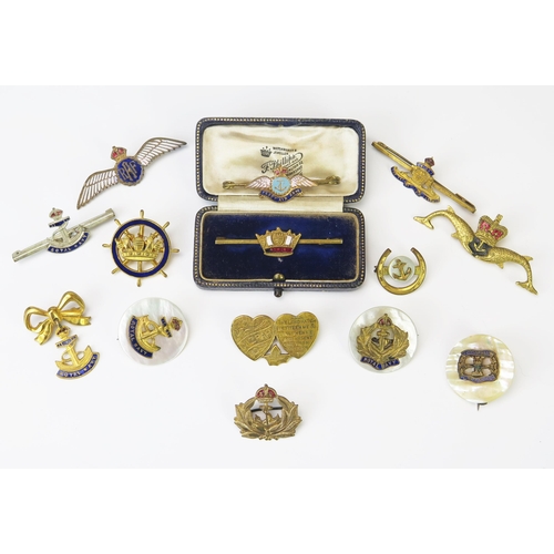 966 - A collection of assorted gilt metal and enamel brooches, includes FAF, Royal Navy, and pothers.