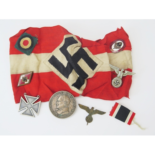 968 - A Third Reich period armband, a silver Maltese cross brooch/pendant, coin brooch, and other badges.